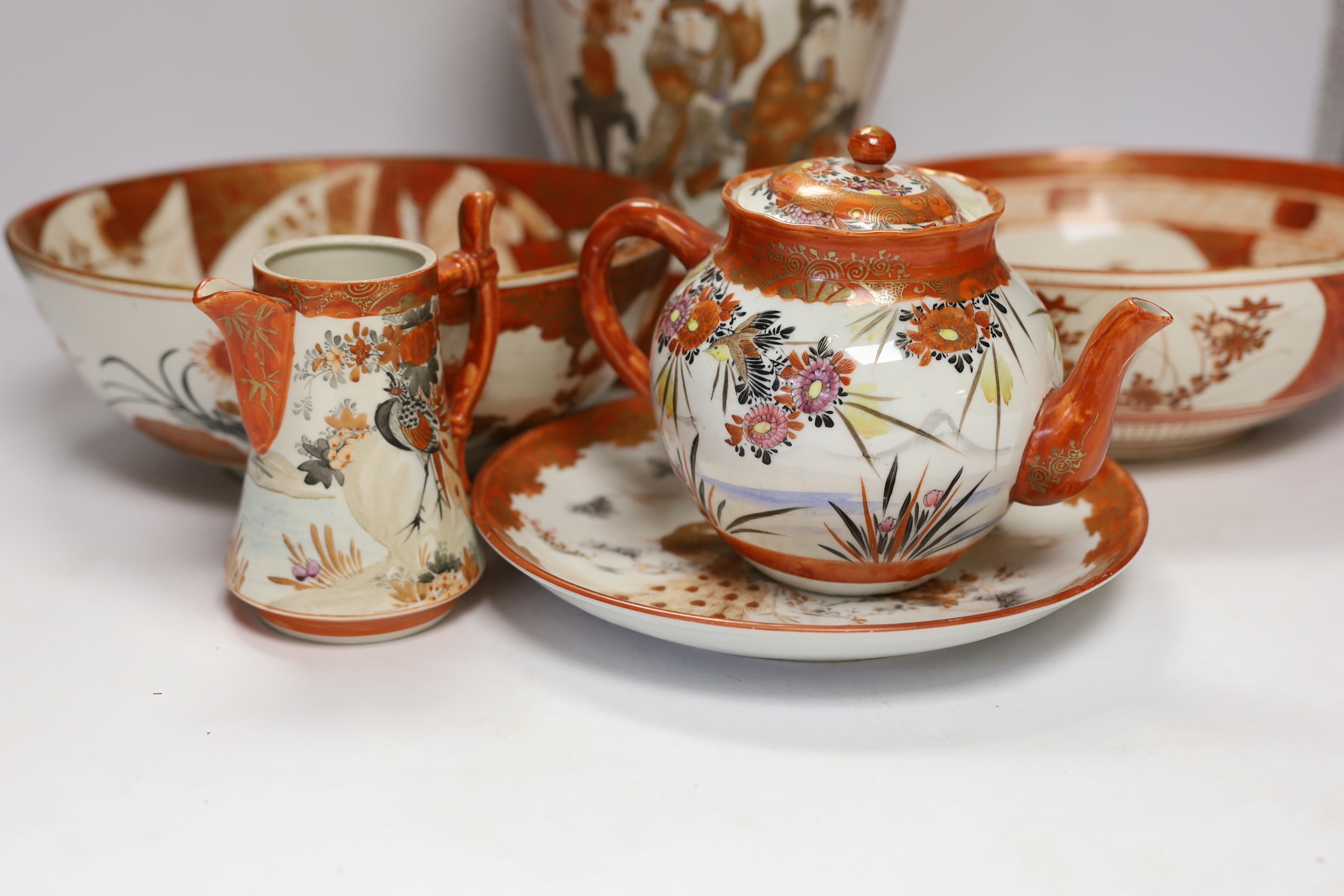 A group of Japanese Kutani porcelain wares including two bowls and a large vase, largest 34cm high